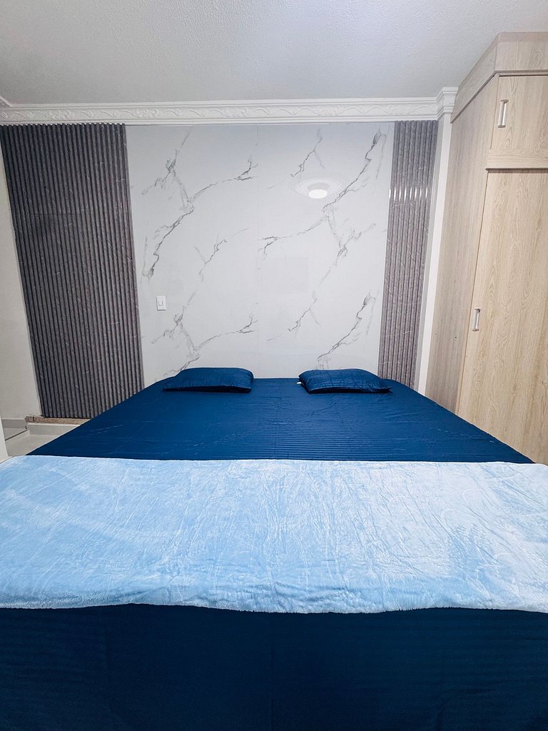 Private room with bathroom and king bed, Valledupar | DIGS